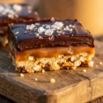 Close-up image of Salt River Bars with caramel layers and flaky sea salt.