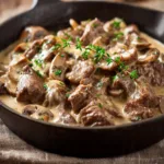 One-skillet beef stroganoff for one with tender beef and mushrooms.